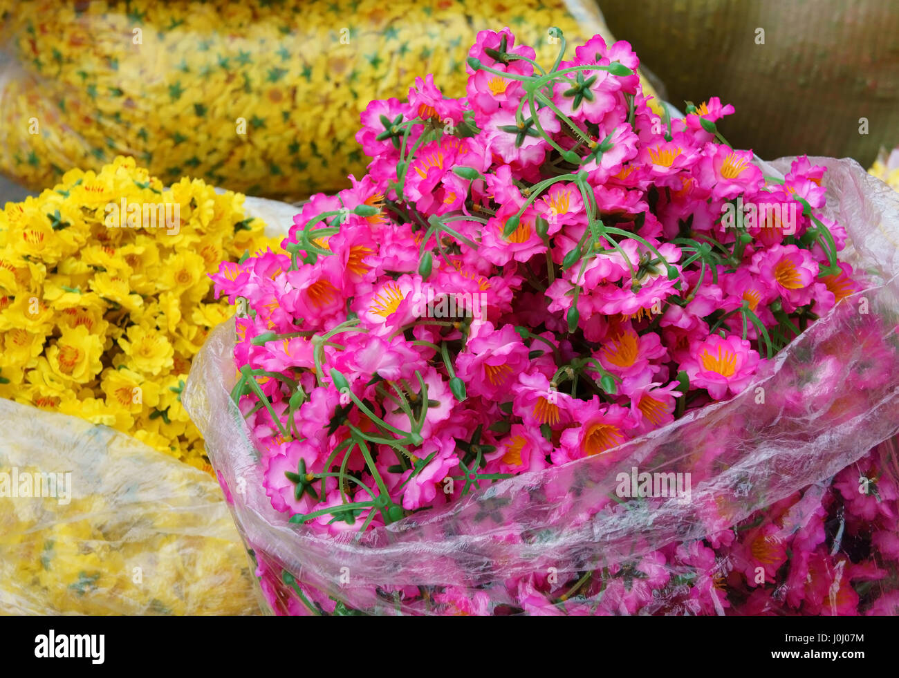 Colourful raw materiral decoration to decorate for house on New Year seasonal at Vietnam, Vietnamese like sakura blossom on Tet, use artificial flower Stock Photo