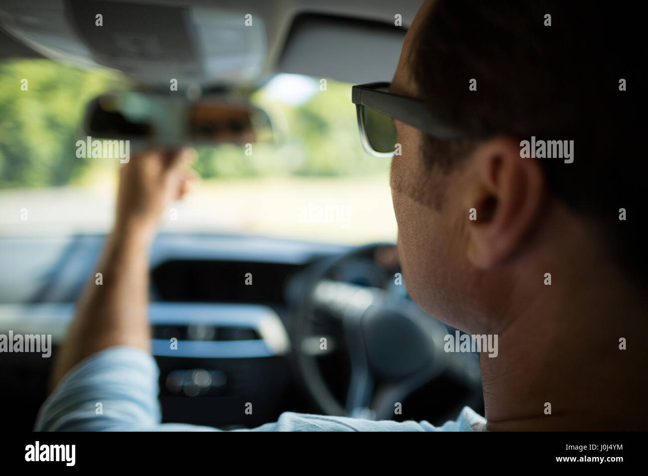 Rearview mirror in car hi-res stock photography and images - Alamy