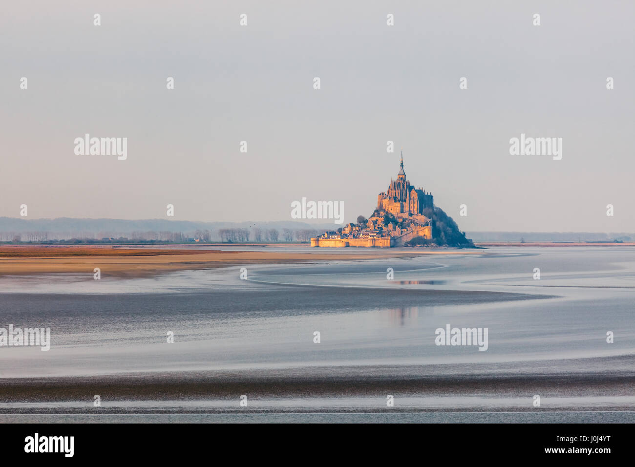 Panoramic view of famous Le Mont Saint-Michel tidal island and Saint-Michel Abbey in Normandy, in the department of Manche, France. Stock Photo
