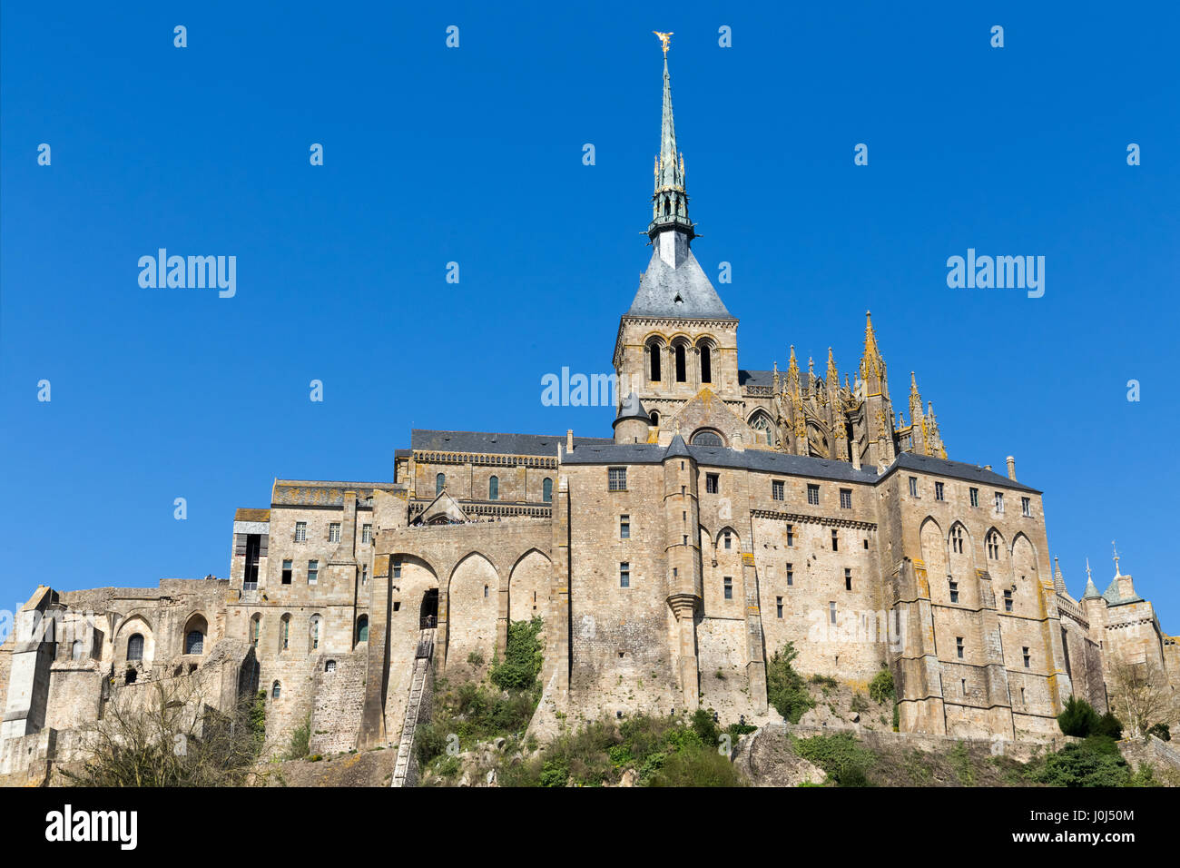 The medieval Mont-Saint-Michel Abbey on a tidal island and mainland commune in Normandy, in the department of Manche, France. Stock Photo