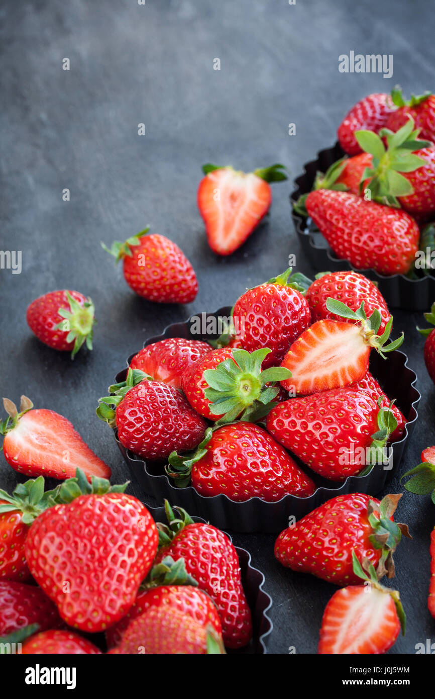 Fresh ripe strawberry on dark background, copy space Stock Photo - Alamy