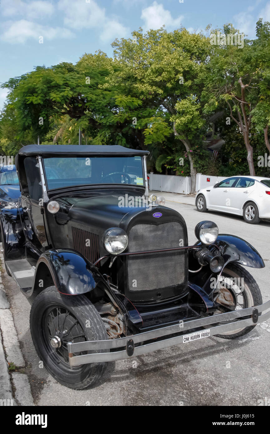 Shay Model A Roadster, a fiberglass reproduction of a Ford Model A placed on a modern chassis, parked on the street. Stock Photo