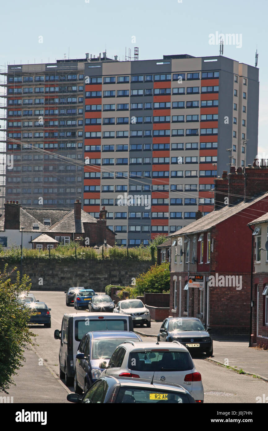 Richard and Bolingbroke Heights flats in Flint , Wales following renovation work in 2016 to put cladding on, the last part of the scaffolding visible. Stock Photo