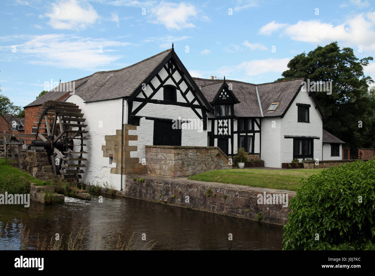 Historic 16th century water mill in the Welsh village of Rossett near