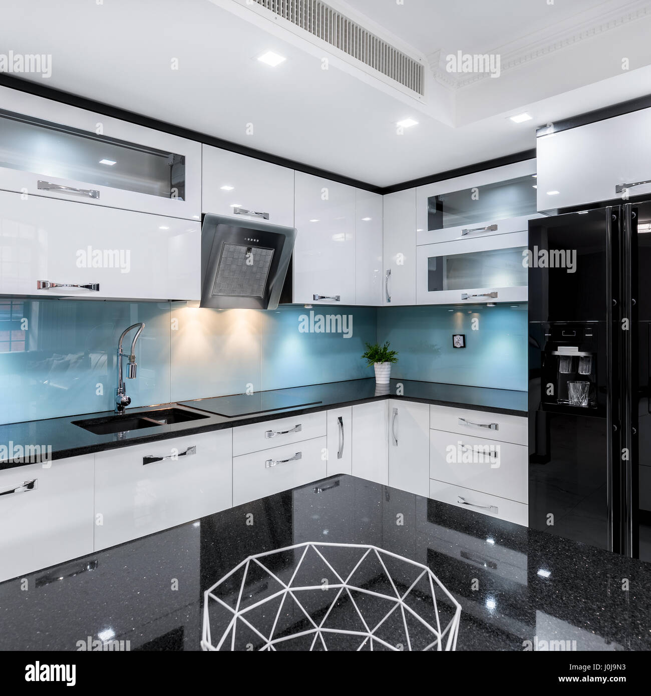 Modern Black And White High Gloss Kitchen With Table And