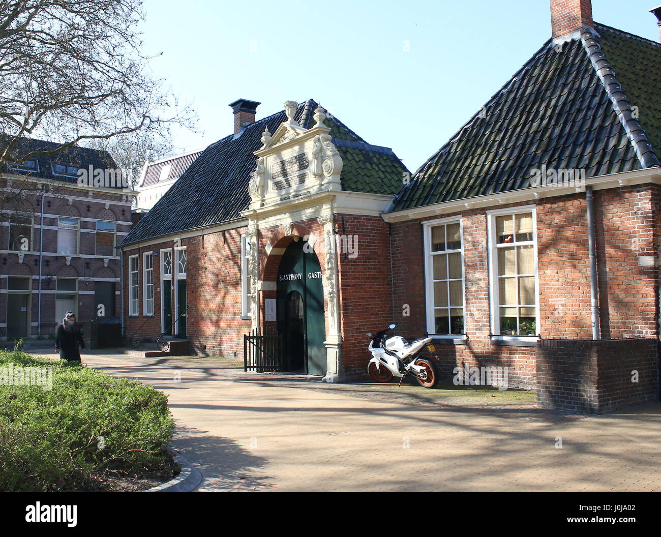 Entrance to Sint Anthonygasthuis (Saint Antony's Hofje = courtyard with Almshouses), inner city of Groningen, Netherlands. Founded in 1517. Stock Photo