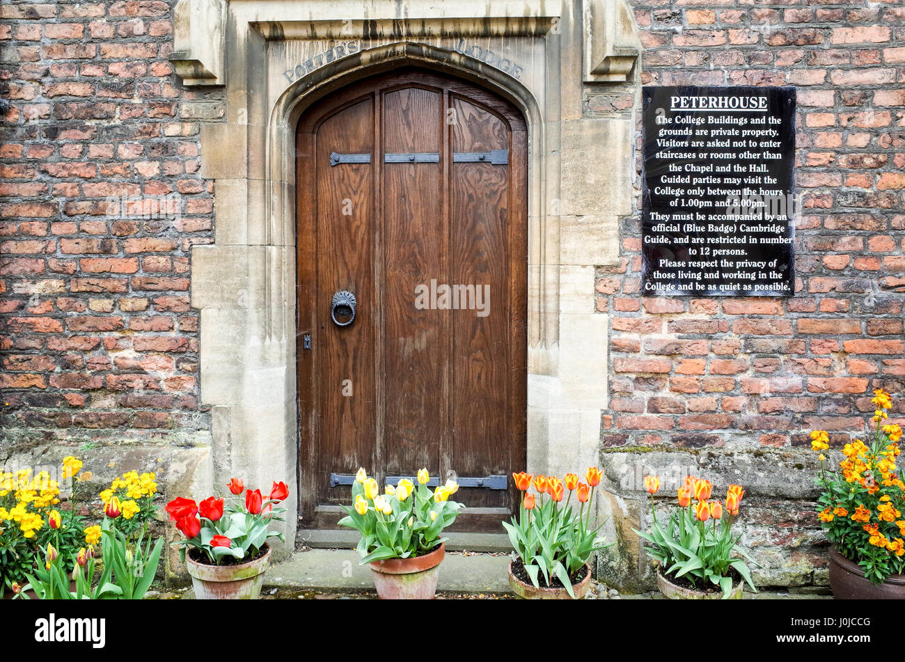 Historic Porters Lodge doorway in Peterhouse College, part of the University of Cambridge. The oldest college in the University, founded in 1284. Stock Photo
