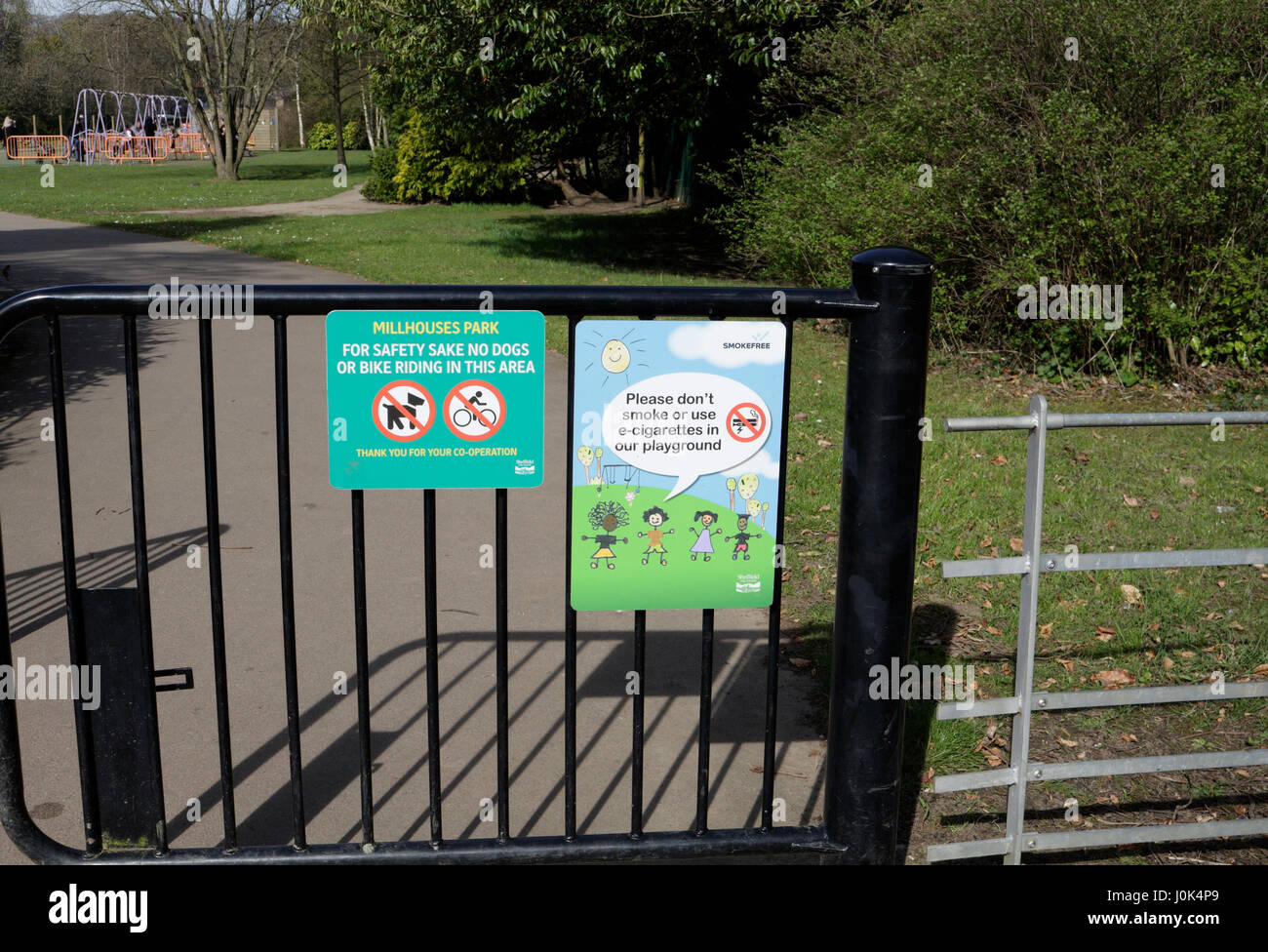 no-dogs-and-no-smoking-signs-near-childrens-playground-stock-photo-alamy