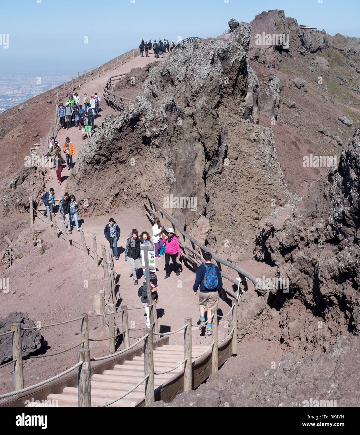 Tourists walk by the rim of the crater of Mount Vesuvius in Campania, Italy  Stock Photo - Alamy