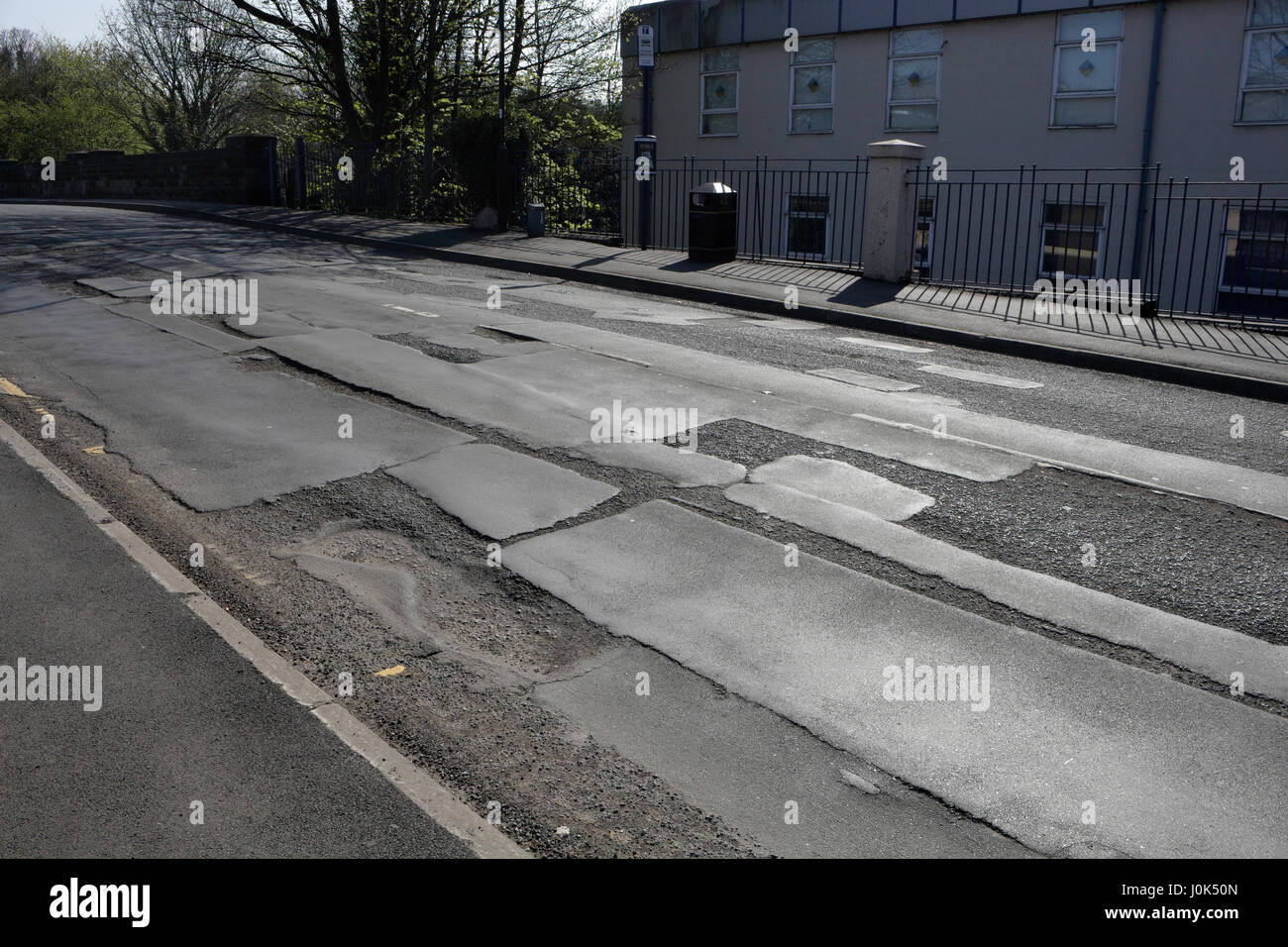 Poor quality road surface, Archer Rd Sheffield England UK Stock Photo