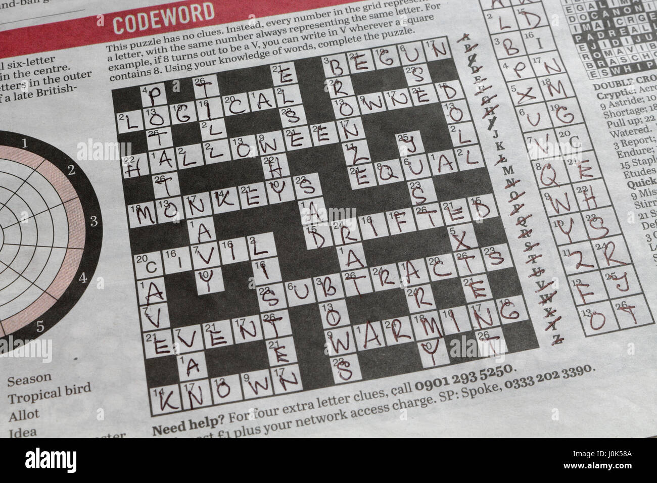 Newspaper codeword puzzle stock photo alamy