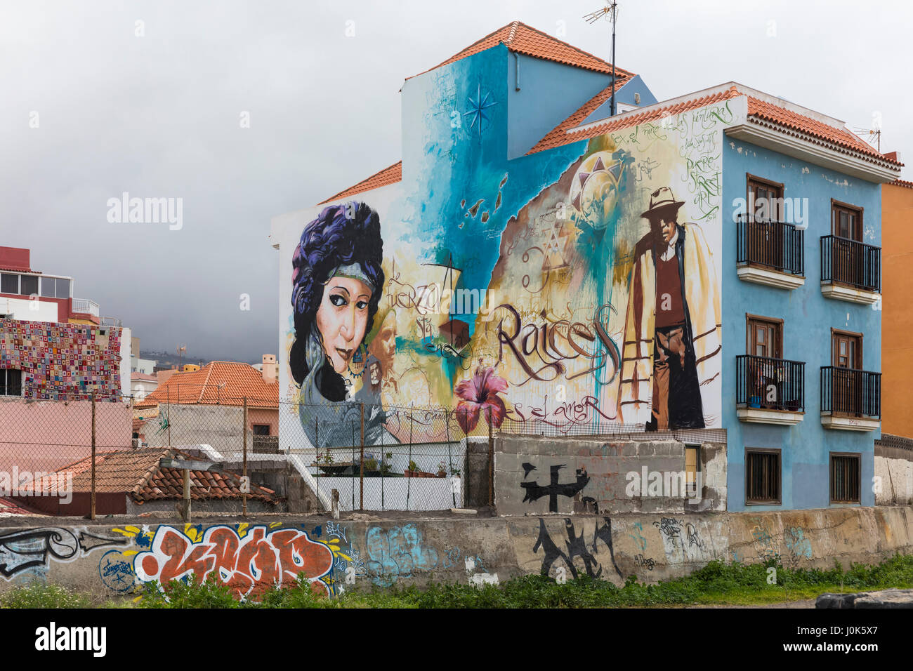 Street view with murals on the walls in Puerto de la Cruz, Tenerife, Spain  Stock Photo - Alamy