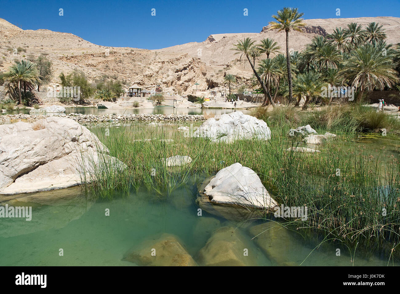 Wadi Bani Khalid - Water source in the desert - Omani oasis Stock Photo