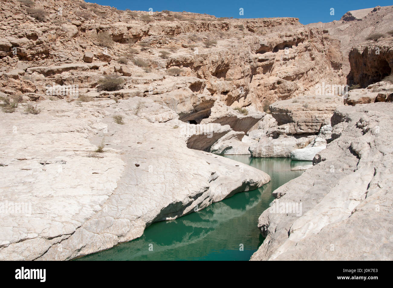 Wadi Bani Khalid - Water source in the desert - Omani oasis Stock Photo