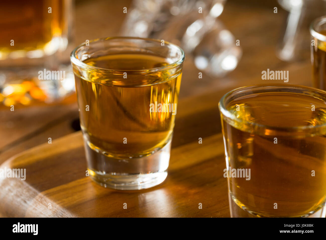 Group of Bourbon Whiskey Shots Ready to Drink Stock Photo