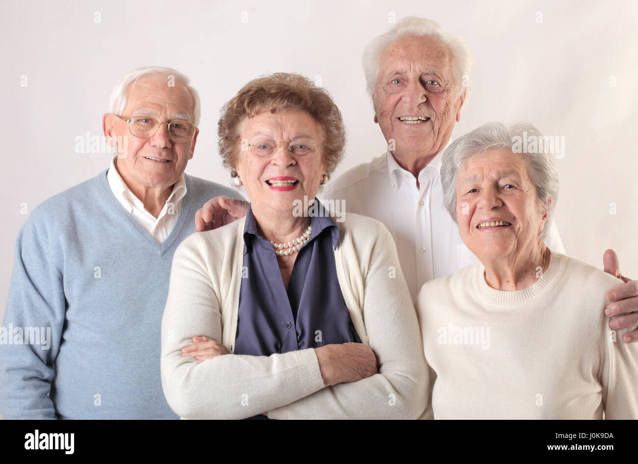 Group of old people posing together Stock Photo