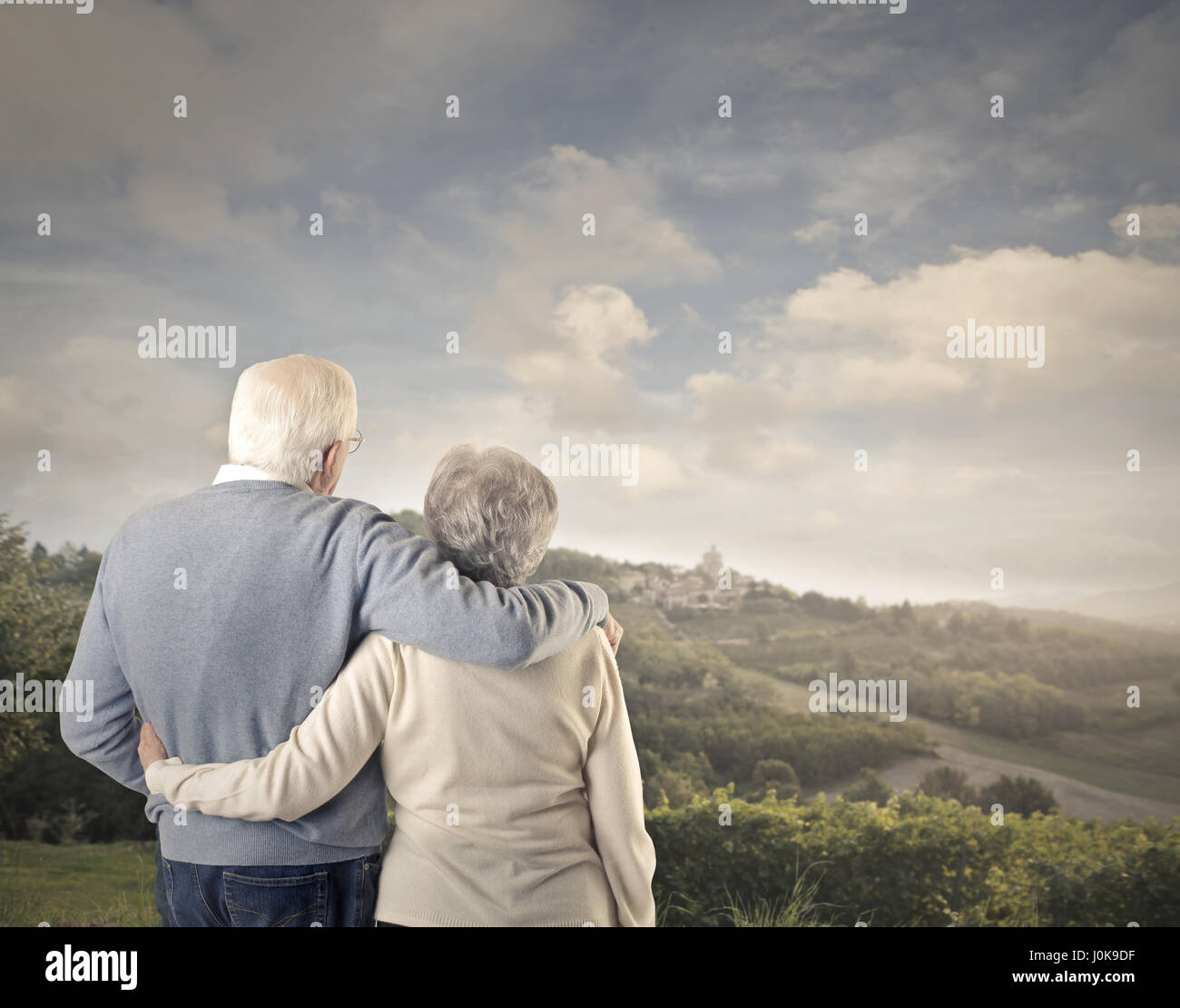 Old couple looking at landscape Stock Photo - Alamy