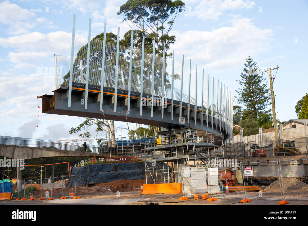 Road footbridge partially complete spanning across Warringah road in Sydney,Australia Stock Photo