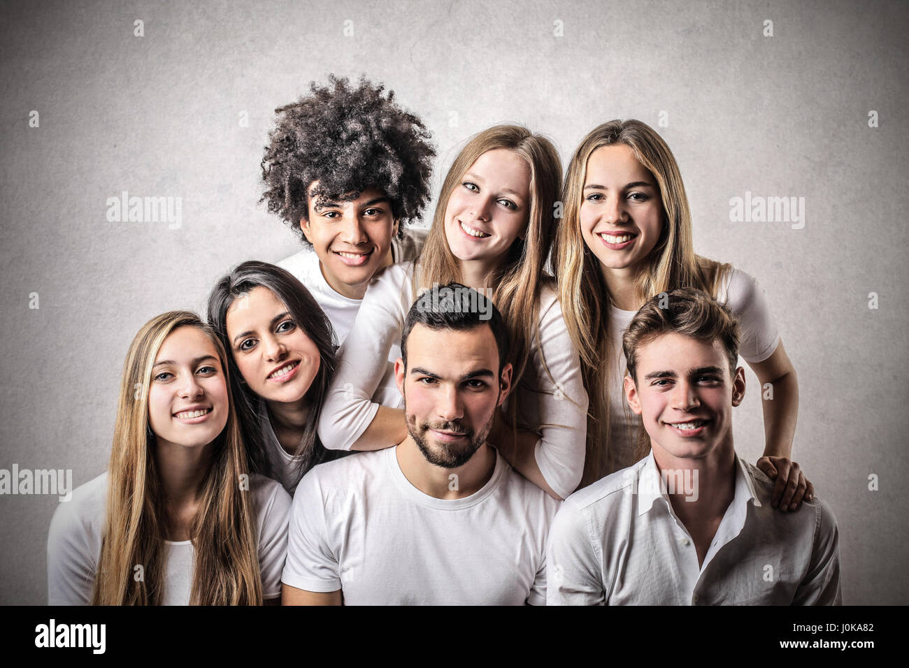 7 friends posing for picture Stock Photo - Alamy