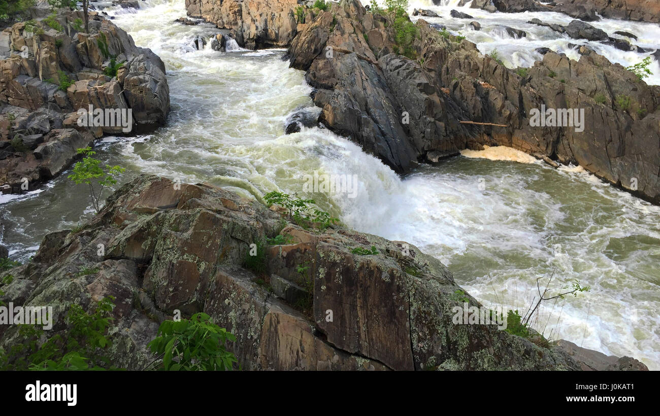 Rapid water running downstream. Stock Photo