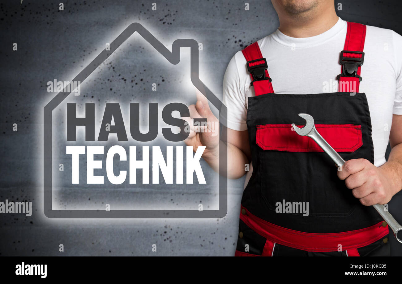 Haustechnik (in german House technology) with house touchscreen is operated by technician. Stock Photo