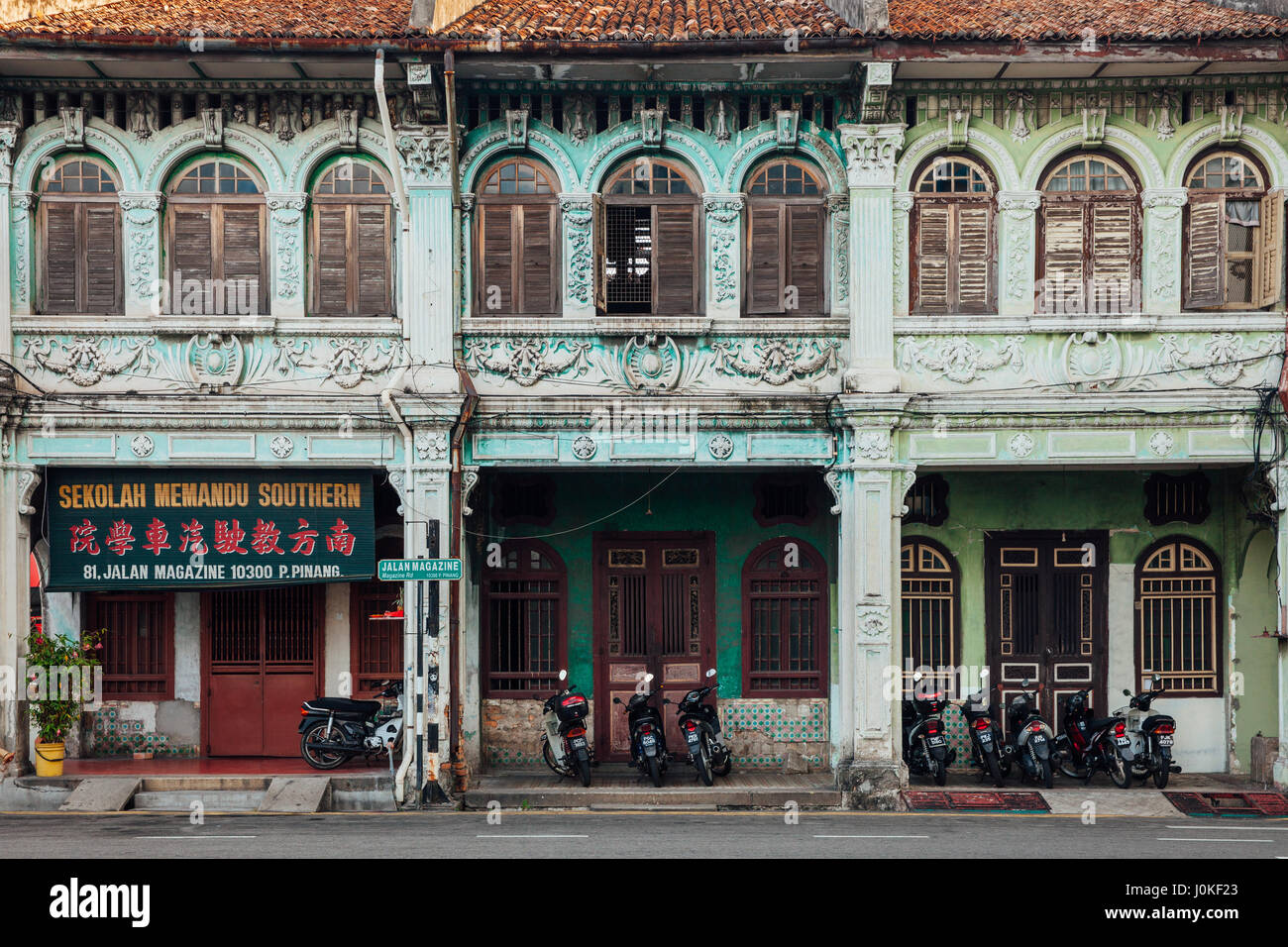 George Town, Malaysia - March 27, 2016: Facade of the old building located in UNESCO Heritage Buffer Zone, George Town, Penang, Malaysia on March 27,  Stock Photo