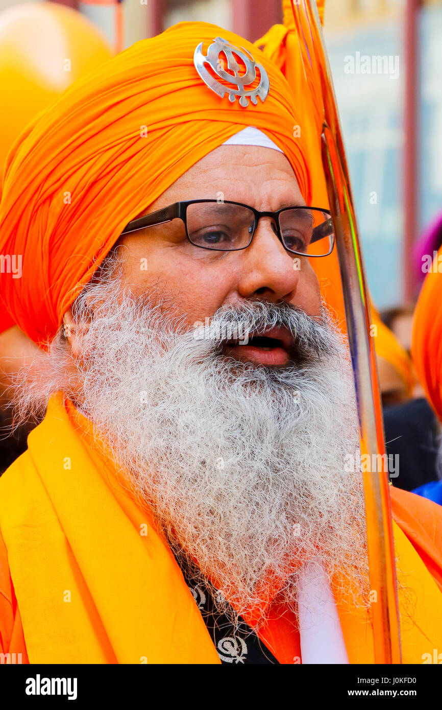 Sikh procesion of religious leaders, Panj Pyare, the beloved ones at the annual harvest festival of Vaishakhi, outside the Gurdwara, Otago Street, Gla Stock Photo