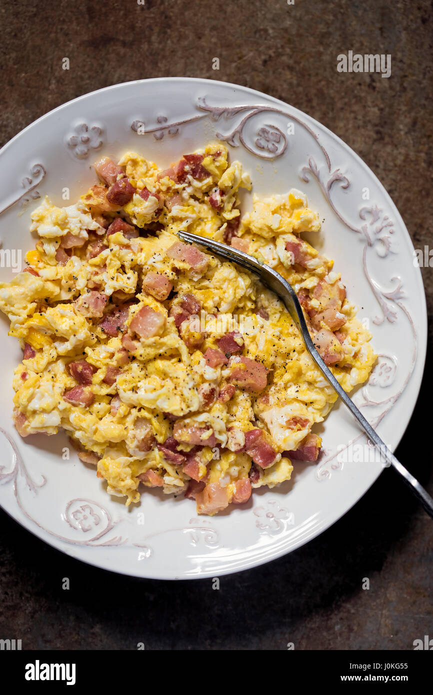 Scrambled eggs with pancetta bacon Stock Photo Alamy