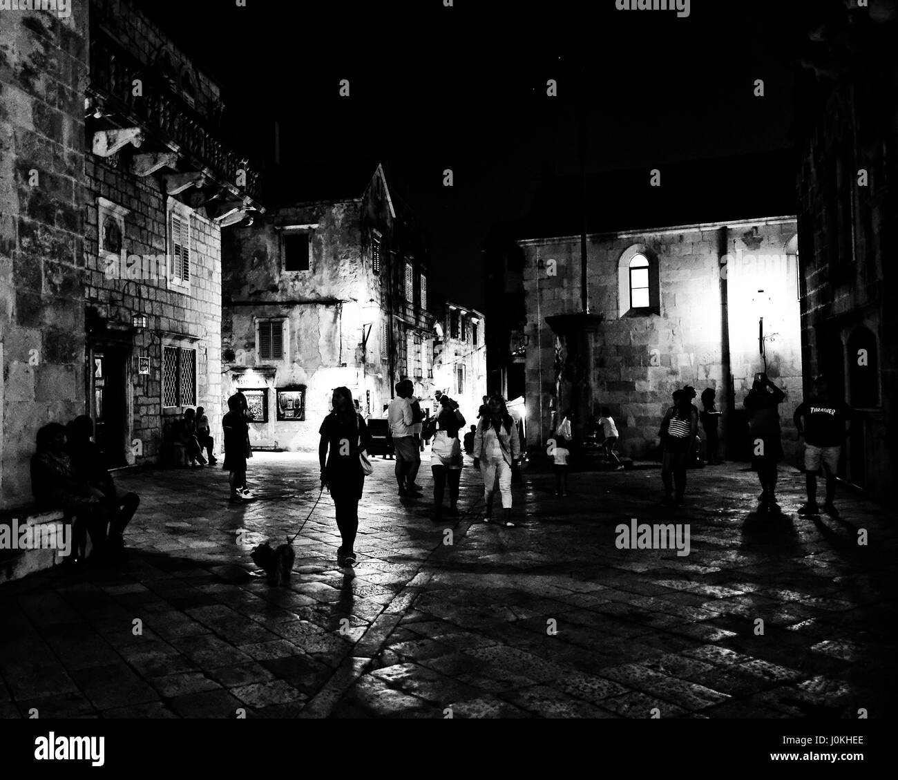 Tourists and locals gather in the local plaza, Croatia Stock Photo