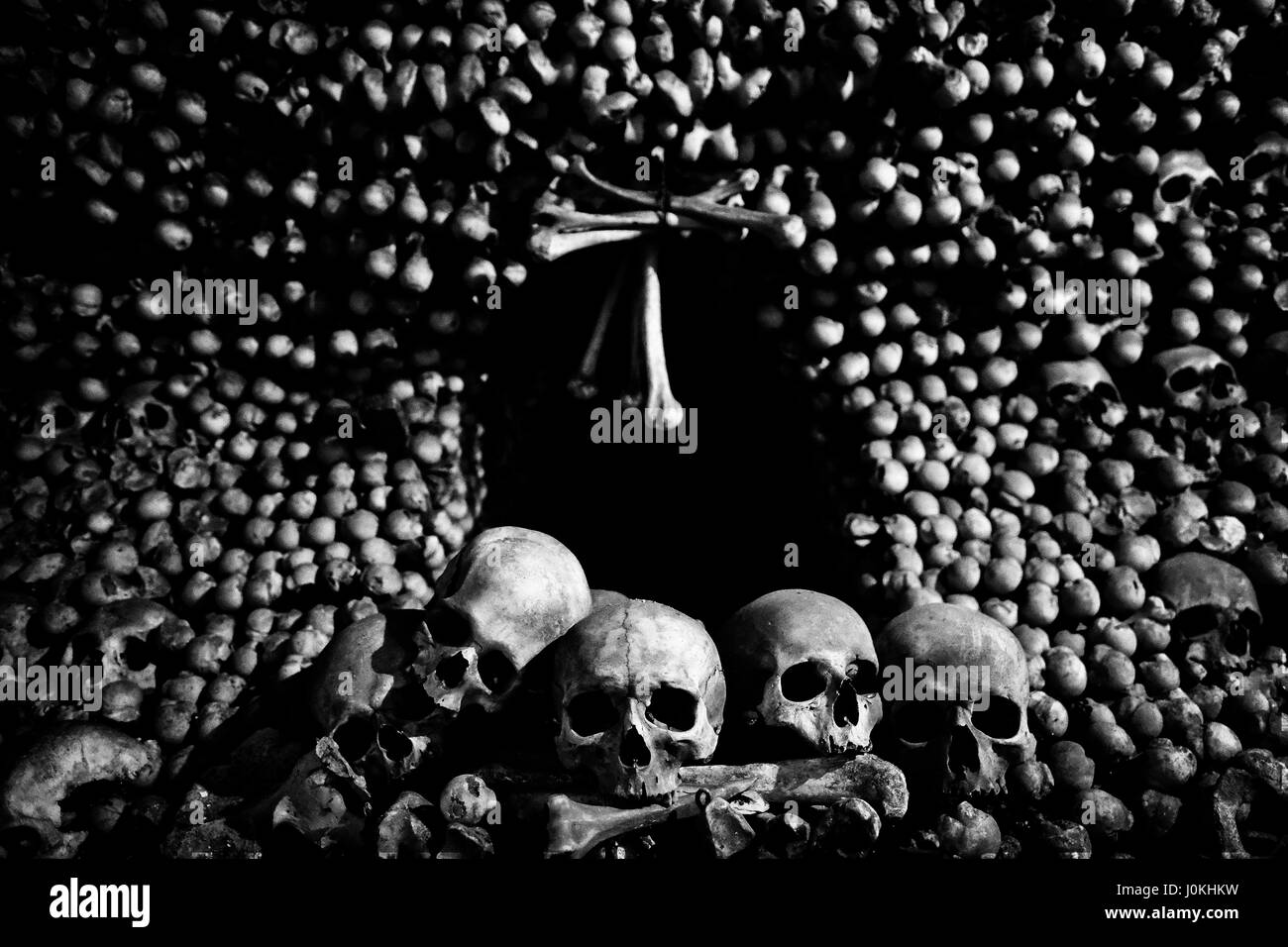 Human Bones and skulls at the Charnel House or Ossuary Kostnice ( Bone Chapel ) in Kutna Hora Czech Republic Stock Photo