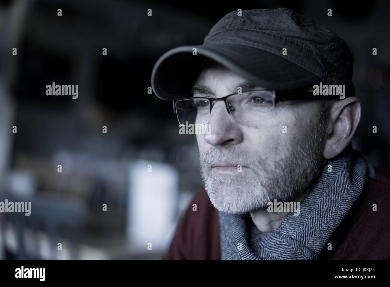 Close up portrait of middle aged male wearing a hat Stock Photo