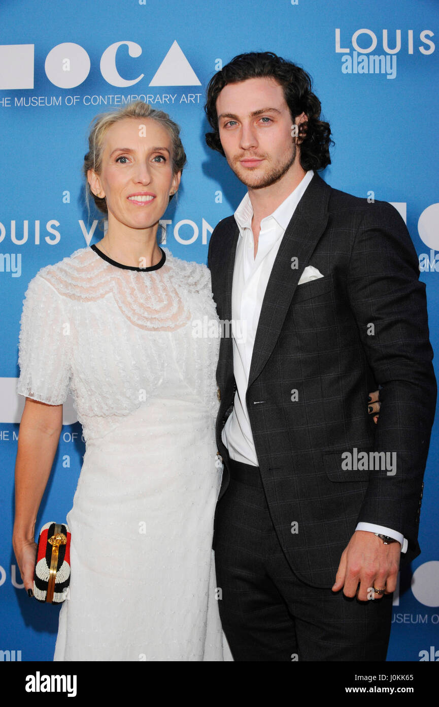 Sam Taylor-Johnson and Aaron Taylor-Johnson arrive at the 2015 MOCA Gala presented by Louis Vuitton at The Geffen Contemporary at MOCA on May 30, 2015 in Los Angeles, California. Stock Photo