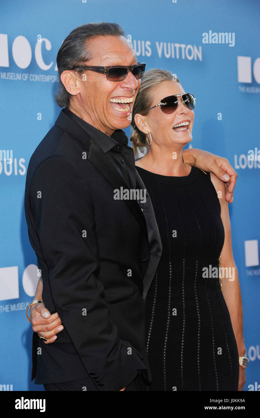 Musician Alex Van Halen and Stine Schyberg (r) arrive at the 2015 MOCA Gala presented by Louis Vuitton at The Geffen Contemporary at MOCA on May 30, 2015 in Los Angeles, California. Stock Photo