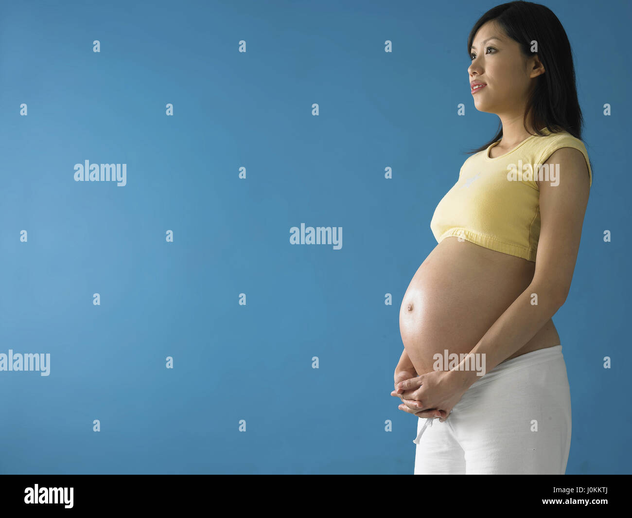 Shot pregnant woman meditating hi-res stock photography and images - Alamy