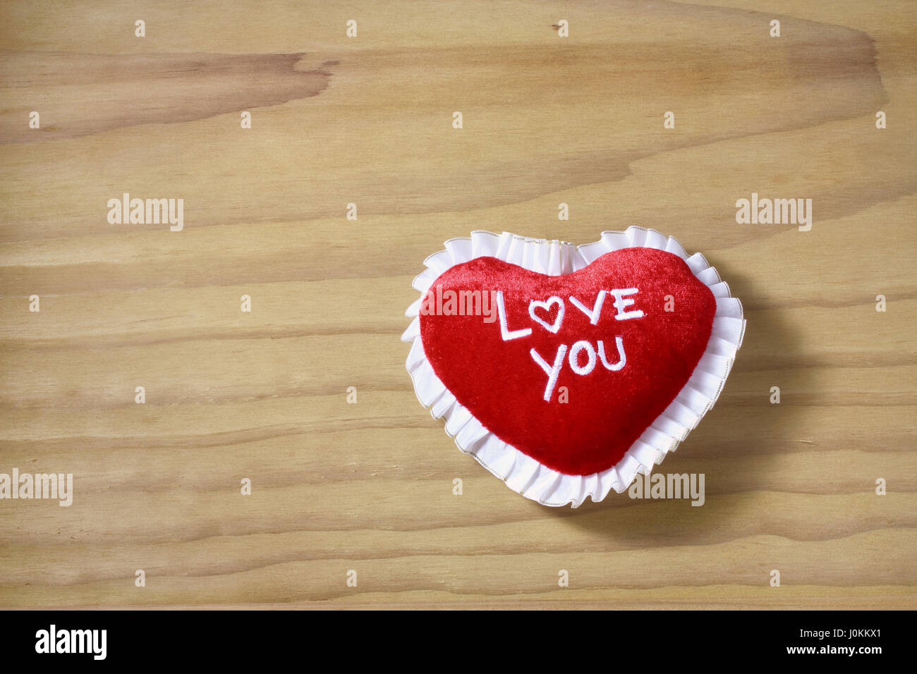 Love Heart on Wooden Background Stock Photo