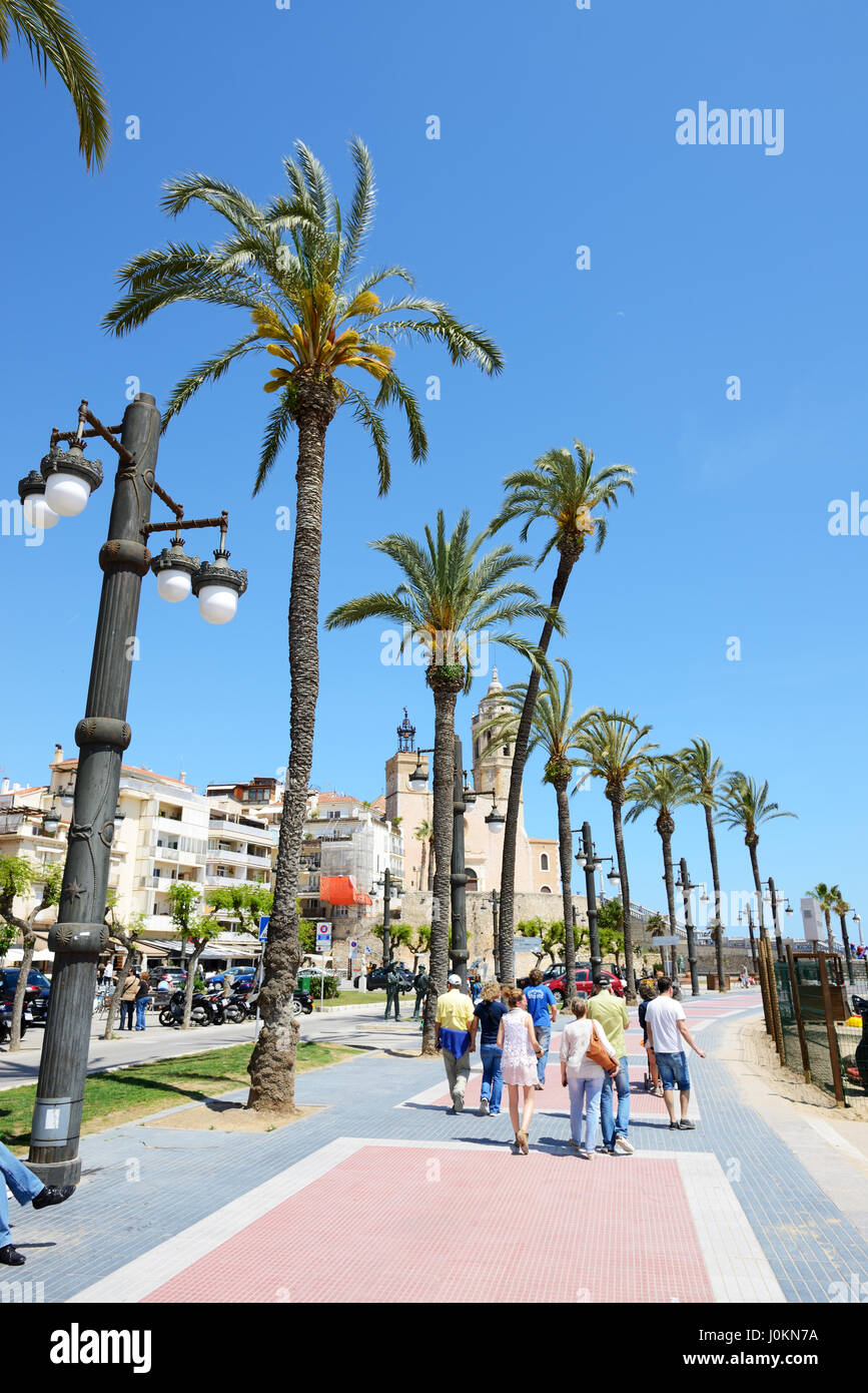 SITGES, SPAIN - MAY 23: The tourists enjoiying their vacation at seafront on May 23, 2015 in Sitges, Spain. Up to 60 mln tourists is expected to visit Stock Photo