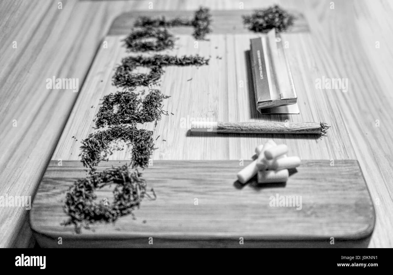 Fake black and White Tobaco and Rolling Paper , filters Stock Photo