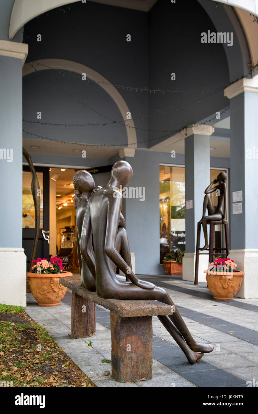 Bronze "Couple on a Park Bench" sculpture at the entrance to The