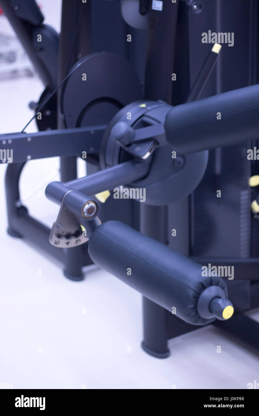 Leg weights extension for quadriceps and curl for hamstrings gym