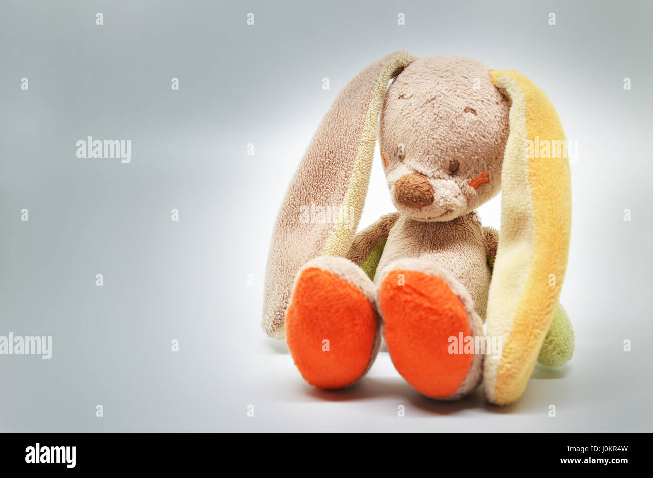 Fluffy rabbit toy on isolated white background Stock Photo - Alamy
