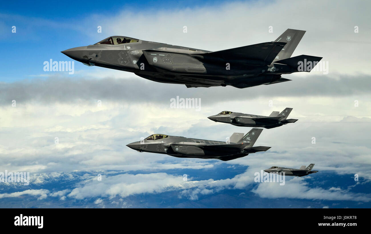F-35A Lightning II aircraft fly in formation Stock Photo