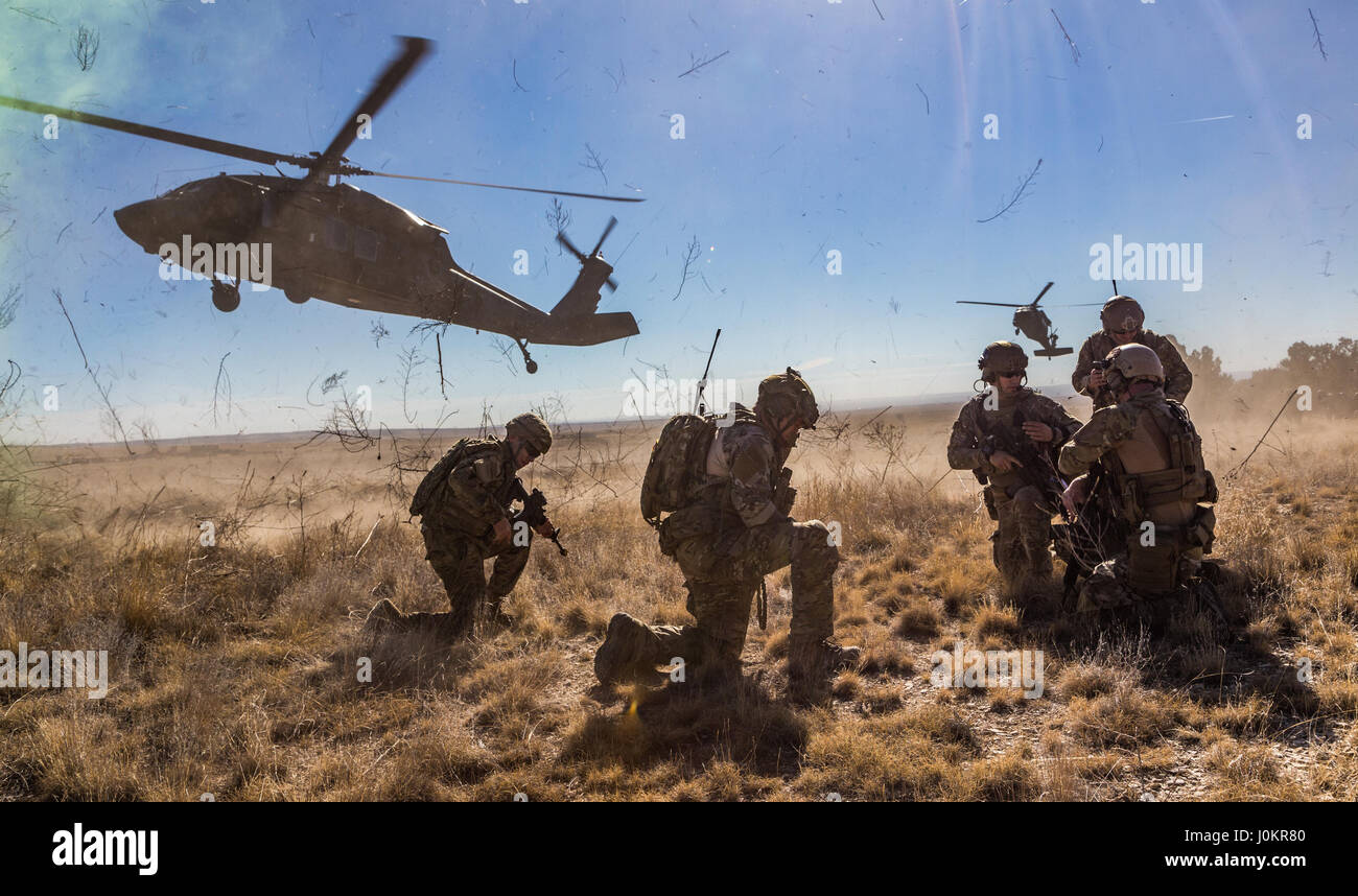 A tactical air control party from the 13th Air Support Operations Squadron at Fort Carson, Colo., prepares for helicopter extraction from the 4th Combat Aviation Brigade Stock Photo