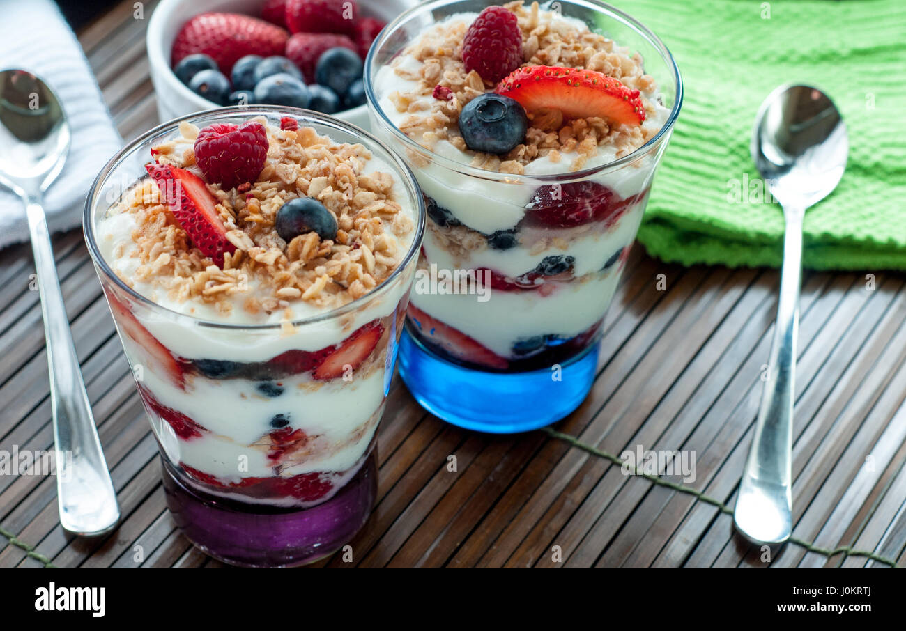 Parfait with fruit in glasses. Stock Photo