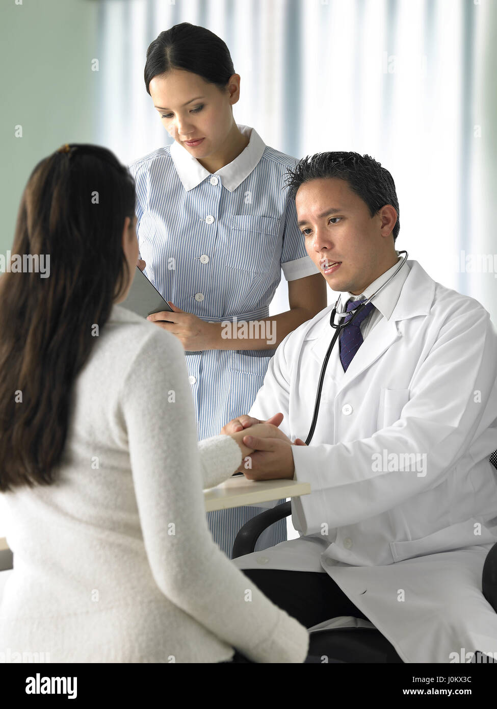 Rear view multi ethnic medical hi-res stock photography and images - Alamy