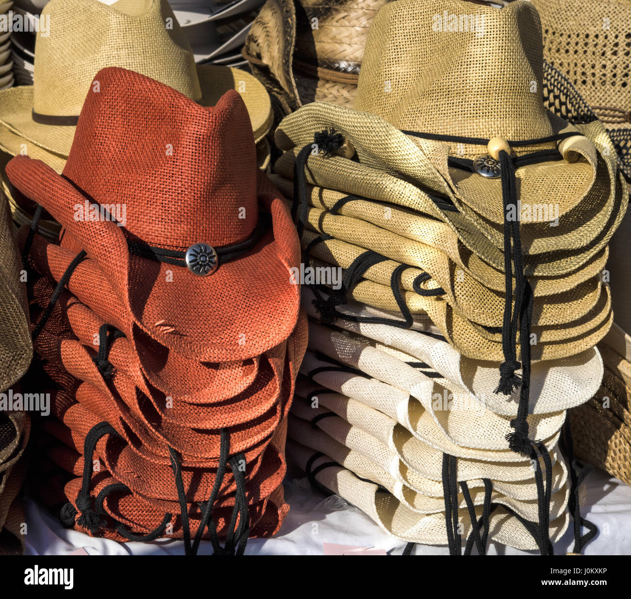 Rack of straw cowboy hats on sale Stock Photo Alamy