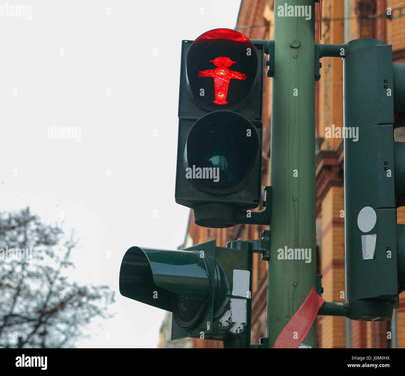 Traffic light on red in East Berlin Stock Photo
