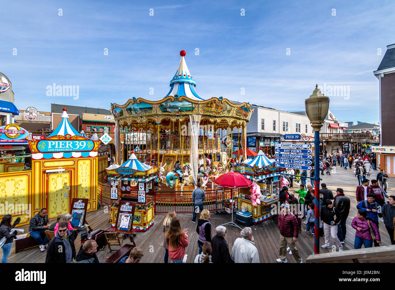 Tourists on Fisherman`s Wharf, Pier 39 at Carousel Editorial Stock