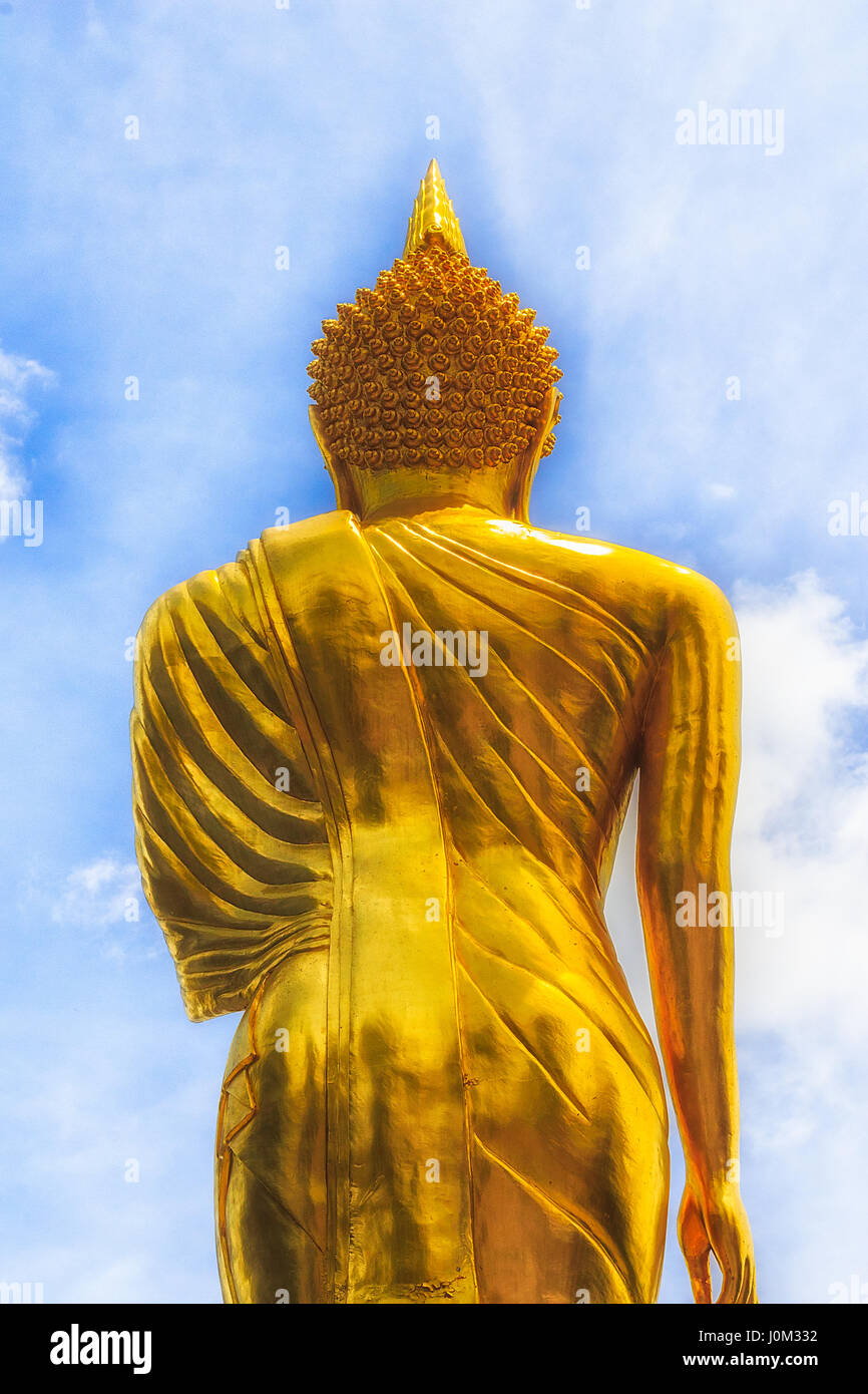Golden Buddha Statue and blue sky in thai temple, Wat Phra That Khao ...
