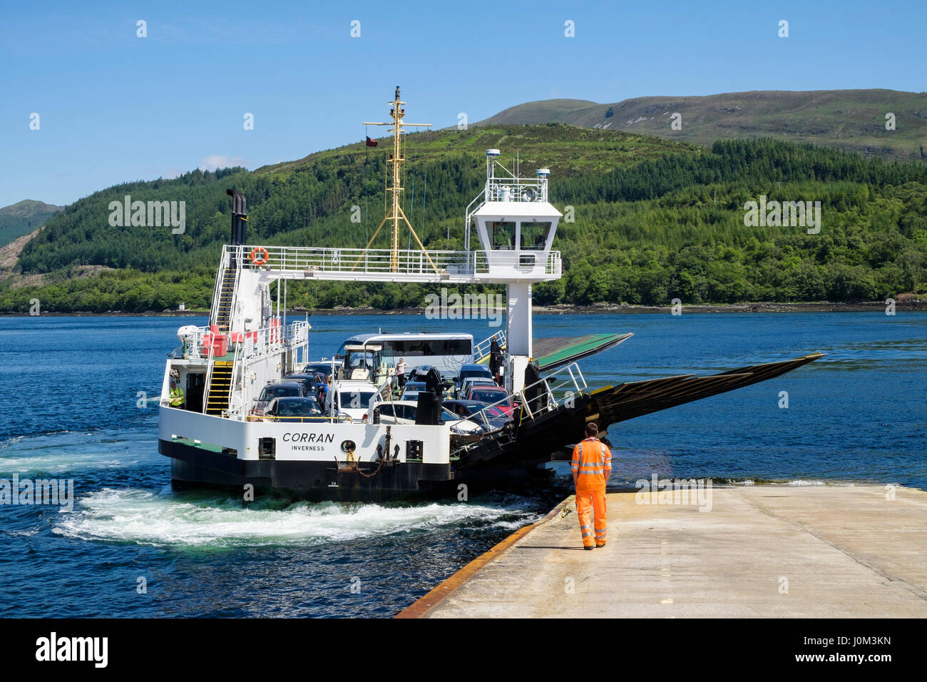 Corran Ferry loaded with cars approaching terminal jetty on shore of Loch Linnhe. Corran, Fort William, Inverness-shire, Highland, Scotland, UK, Brita Stock Photo