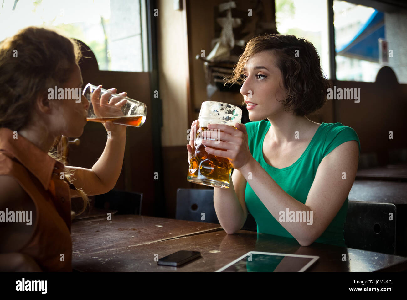 Friends getting together and drinking beer Stock Photo
